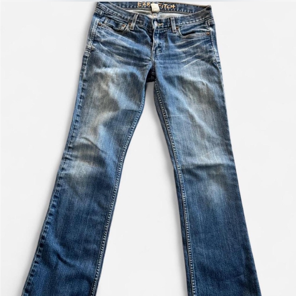 Light blue wash denim flare low rise jeans.